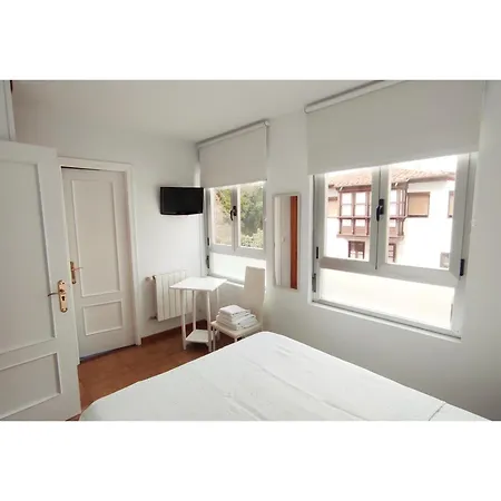 ** Comillas